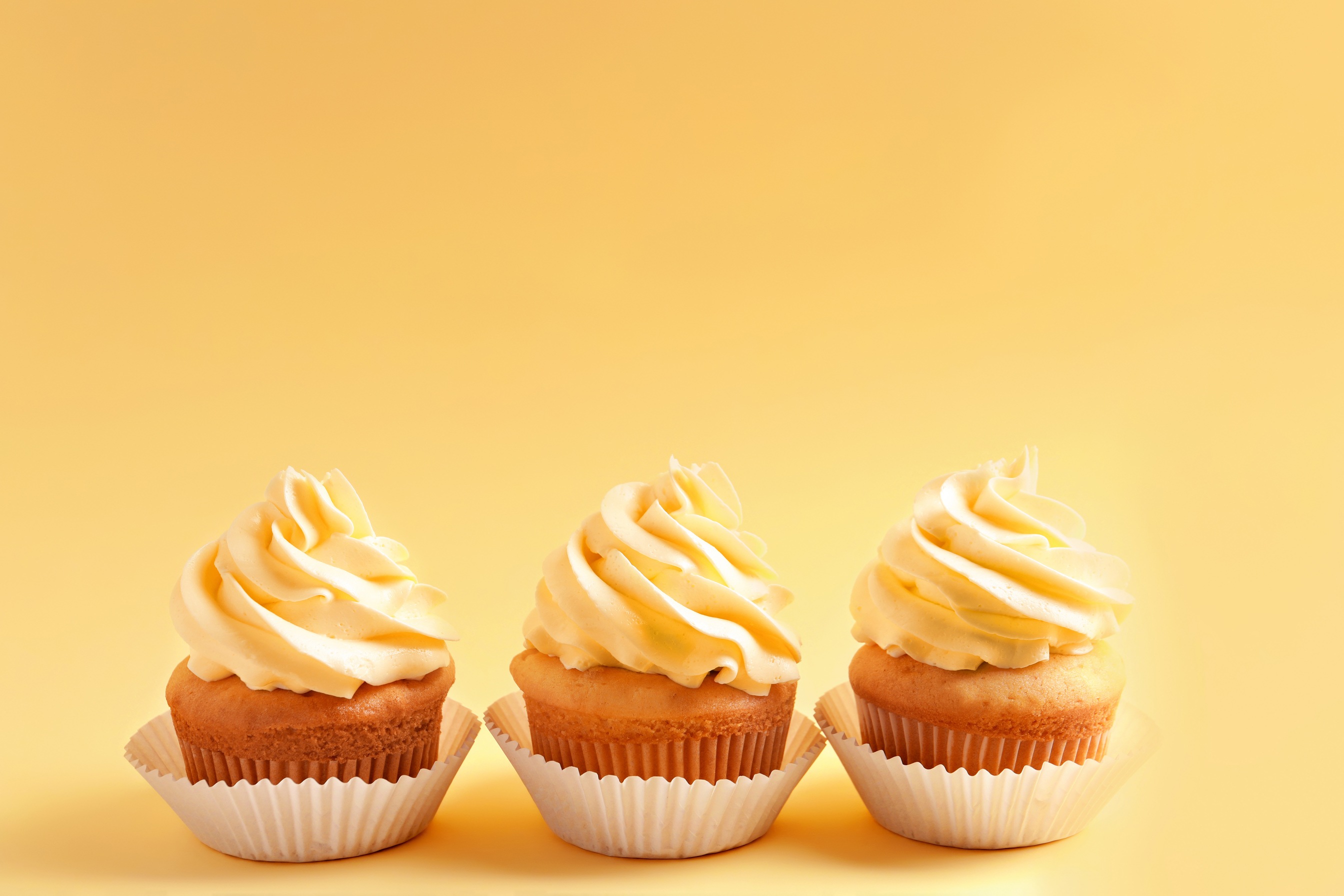  Cupcakes with Yellow Frosting